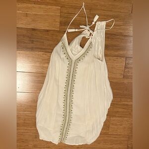 White dress with gold embroidery
